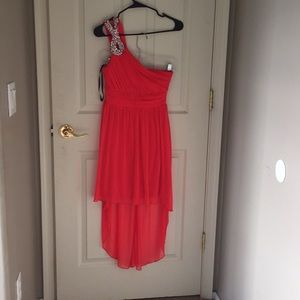 One shoulder high-low evening dress.